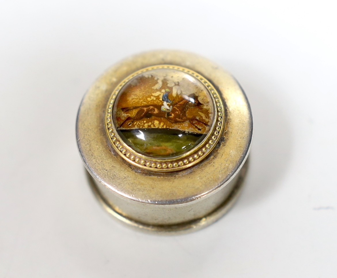 A George V silver and Essex crystal inset pill box, the crystal depicting a horse and jockey, maker CE, London, 1933, diameter 32mm.